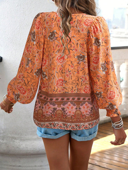 Blusa da donna con stampa floreale boho e nodo al collo