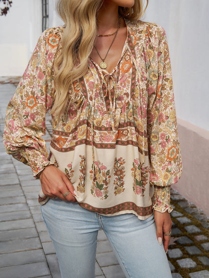 Blusa da donna con stampa floreale boho e nodo al collo