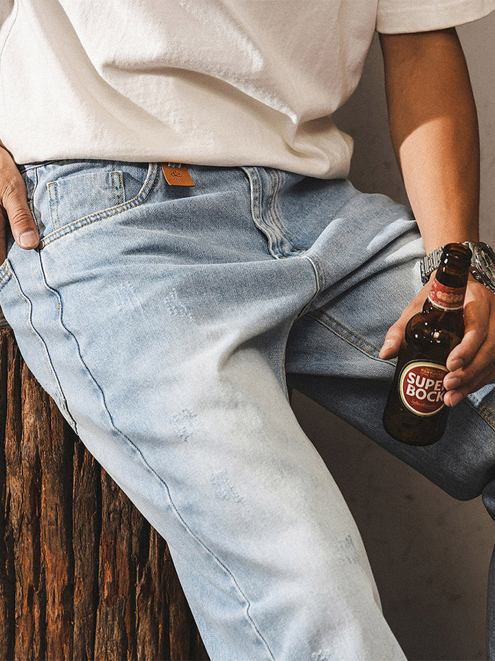 Jeans da uomo con lavaggio delicato e dettagli in stile vintage