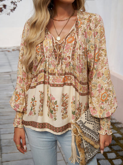 Blusa da donna con stampa floreale boho e nodo al collo