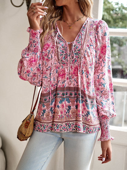 Blusa da donna con stampa floreale boho e nodo al collo