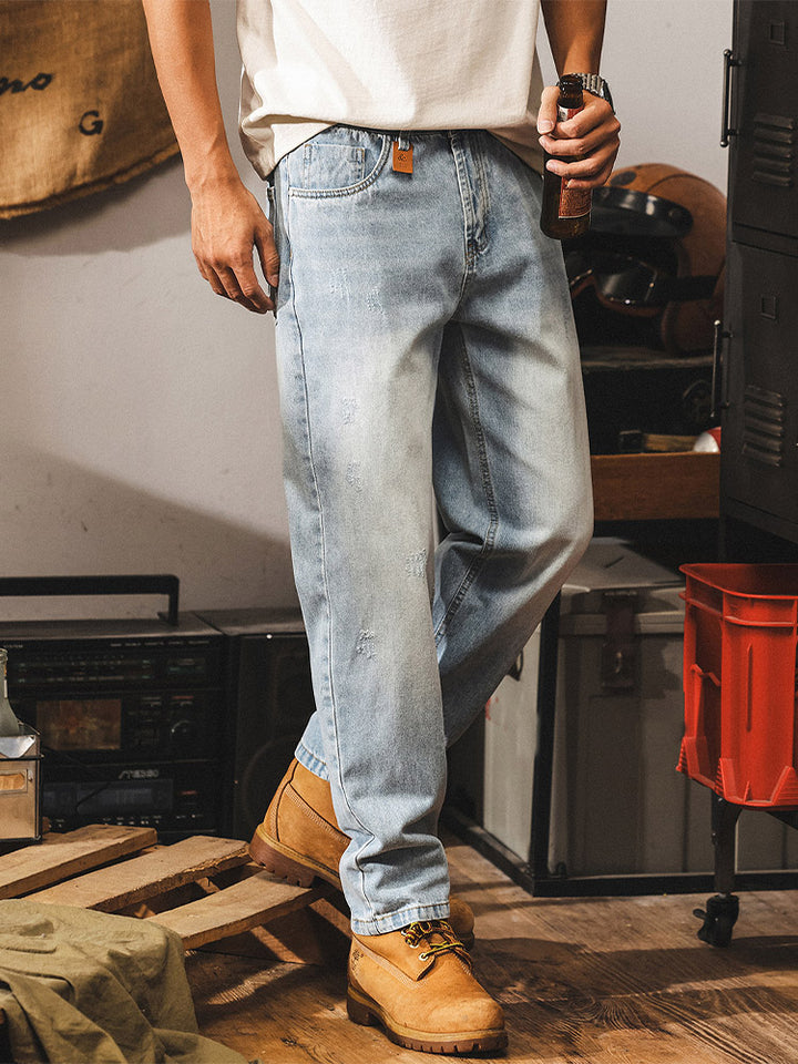 Jeans da uomo con lavaggio delicato e dettagli in stile vintage