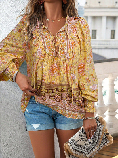 Blusa da donna con stampa floreale boho e nodo al collo
