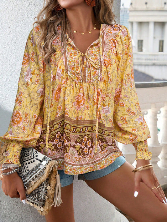 Blusa da donna con stampa floreale boho e nodo al collo